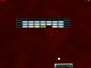 Screenshot of the Brick! Three brick breaker game showing a paddle, a bouncing ball, and a field of colorful bricks with explosion particle effects