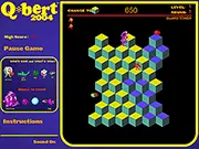 Screenshot of Q*bert 2004 game showing the orange Q*bert jumping on a pyramid of cubes to change their color, with the purple snake enemy Coily in pursuit.