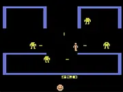 Stick-figure shooting a robot in a maze in the free online retro game Berzerk