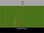 Screenshot of the classic Atari game Kaboom! showing a flying bomber aircraft, falling black bombs, and a row of buckets at the bottom of the screen ready to catch them.