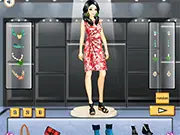 Model in the Print Mania Dress Up game wearing a stylish dress with a vibrant pattern and accessories, ready to play free online