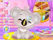 Baby Koala Salon game screenshot, caring for and cleaning a baby koala, play free online animal care game