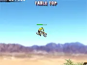 BMX Trials Pro game screenshot, performing bike stunts off a jump, free online BMX game on PlayArcadeHub.