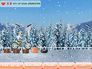 Stunt Acrobat 2 free online game screenshot, motorcycle jumping over an obstacle on uneven winter terrain, uphill racing game