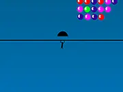 Free online game Jumble Sky Dive showing a paratrooper freefalling from a plane to collect colorful bubbles in the sky