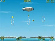 Stunt Pilot Trainer plane flying through a checkpoint ring in a free online game