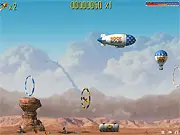 Stunt Pilot 2 free online game screenshot, a biplane flying through a glowing ring in the air.