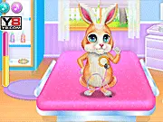 Bunny Medical Care game scene; cute bunny with a doctor; free online animal care and dress-up game for kids