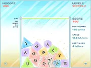 Screenshot of the Word Reactor game showing colorful letter blocks falling into a chamber, with a word being highlighted by the cursor and a laser visible at the bottom.