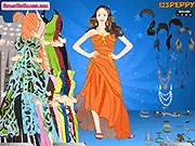 Screenshot of Gala Fashion Dress Up game showing the model Brigitte wearing an elegant red carpet gown with a selection of high-end accessories displayed on the screen