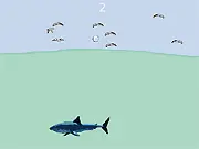Play Shark Farts free online arcade game, shoot gas at birds, funny high score game
