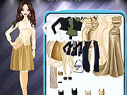 Screenshot of Golden Age Dressup game showing a model wearing an elaborate flowing golden gown and a jeweled tiara, surrounded by opulent accessories