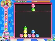Screenshot of the free online puzzle game Two Marbles showing colored marbles being matched and popped