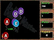 Screenshot of the Balloon Master 2 typing game showing several colorful balloons floating upwards, each displaying a single letter that the player must type.