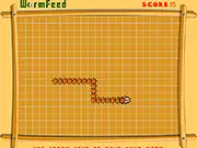 Screenshot of the Wormfeed Classic game showing a long green worm chasing a red apple while navigating a tight space and avoiding its own body.