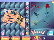 Glam Nails game screenshot showing a hand with elaborately decorated nails, free online manicure and nail art game