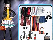 Fall Street Chic free online dress-up game showing a stylish model wearing a warm, layered autumn outfit, including a cozy sweater and a knitted hat.