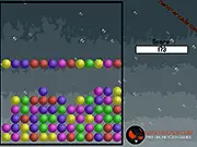 Screenshot of Poppers online game board with colored blocks and a high score counter. Play free color-matching puzzle game.