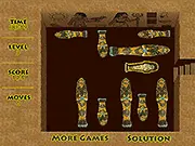 Free online game screenshot for Pyramid Raider showing a sliding block puzzle with a mummy sarcophagus blocked by coffins inside an ancient Egyptian tomb.