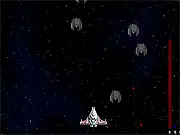 Space Hitters classic 2D space shooter game screenshot with a small spaceship firing blue lasers at multiple red alien ships. Play free online.