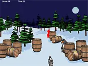 When Penguins Attack! free online game screenshot showing Santa being defended from an invasion of evil cartoon penguins