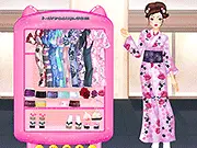 A model wearing a beautiful, brightly colored Japanese Kimono with a detailed obi sash and traditional hair accessories in the free dressup game