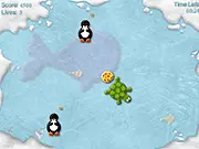 Gameplay screenshot of the free online game Dizzy Turtle showing a spinning turtle on an ice field surrounded by pizza slices and sleeping penguins.