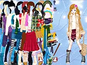 The Natural Magic Dress game screenshot: Cute lady dressed in an elaborate green and gold fantasy outfit with magical effects. Play the free online fashion dress up game.