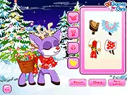 Gameplay screenshot of Pet Stars: Baby Rudolph game, showing the baby reindeer being cleaned and groomed with various holiday-themed tools.
