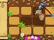 Gameplay screenshot from Find Dinosaur Bones showing an old map, a pickaxe, and partially visible dinosaur fossils buried under layers of stone and dirt.