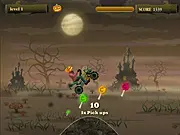 Pumpkin Head Rider game screenshot, showing a character with a pumpkin for a head riding a vehicle across a hilly track in a Halloween-themed town