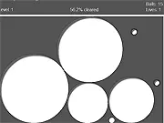 Filler free online puzzle game screenshot, large circular balls filling 2/3 of the screen, avoiding a smaller bouncing hazard ball