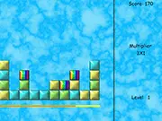 Screenshot of Cubius Puzzle online game, showing a grid of brightly colored red, yellow, and blue cubes ready to be matched and cleared