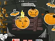 Gameplay screenshot of the Jack-O-Lantern Designer game, showing a pumpkin being decorated with various eyes and mouth shapes for Halloween.