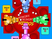 Screenshot of the free online arcade game Hungry Hippos, showing multiple colorful hippos trying to eat glowing food.