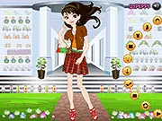The character Alexia wearing a beautiful Easter-themed dress and holding an accessory in the free online dress up game