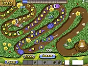 Screenshot of the free online word puzzle game Snakes N Letters showing the hamster Hammy, letters, and approaching green snakes.