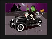 Gameplay screenshot of the Addams Family Halloween puzzle game in progress, showing several scattered jigsaw pieces featuring Morticia, Gomez, and Wednesday Addams in a spooky mansion.