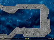 Screenshot of Space Madness free online game showing a spaceship navigating the corridors of a dark, abandoned sci-fi mining station.