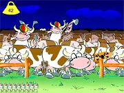 Screenshot of Mad Cows! clicker game showing cartoon cows rapidly moving across a green field background