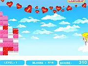 Screenshot of the free online puzzle game Angel Strikes showing a grid of various colored blocks themed for Valentine's Day.