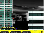 Dirt bike rider performing a jump on a dark, challenging obstacle course in the free online game, Dark Dirt Bike 2