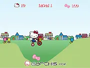 Hello Kitty riding a pink bicycle in the city, collecting bows, free online arcade game