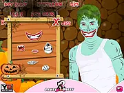 Screenshot of Justin Bieber Halloween Touch Up free game, showing the pop star with scary costume makeup and a spooky outfit for a Halloween party