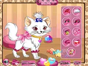 Screenshot of Kitty the Cat Dress Up game showing the cute cat wearing a fashionable outfit and accessories. Play free online.