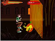 Ben 10 Omniverse Ghost Town game screenshot - Ben 10 fighting ghost-pumpkins