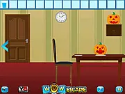 Wow Happy Halloween Escape online game screenshot showing a room filled with Halloween decorations, smiling pumpkins, and hidden puzzle objects