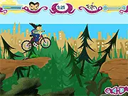 Party Interrupted Bike Rush online game screenshot, a biker jumping over holes and rocks on a mountain trail