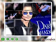 Screenshot of Johnny Deep Puzzle Game, showing a grid of scrambled image tiles of the actor Johnny Depp waiting to be solved