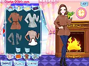 Screenshot of Winter Fun dress-up game, showing the character Audrey ready to be dressed in stylish winter sweaters and accessories.